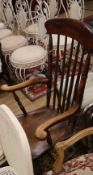 A Victorian elm and beech Windsor comb back armchair