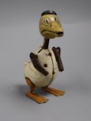 Schuco, German, A tinplate clockwork Donald Duck, circa 1930, lacking clothing and hands height 13.