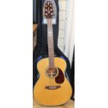 A crafter acoustic guitar with carry case