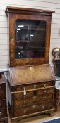 A George I walnut bureau bookcase of narrow proportions W.76cm