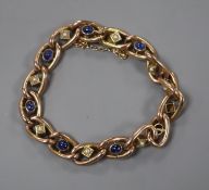 A yellow metal fancy curb-link bracelet set with cabochon sapphires and pearls.