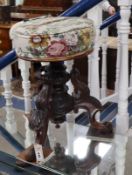 A Victorian carved mahogany adjustable piano stool