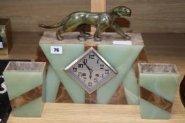 After Decoux. A bronze panther French Art Deco clock garniture clock height 30cm