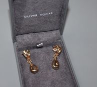 A pair of 9ct yellow gold earrings with tear-shaped drops.