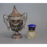 A silver urn and cover, swag and acanthus decoration, London 1935, D & J Welby (a.f.) and a silver