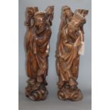 A pair of Chinese carved hardwood figures of sages height 53cm