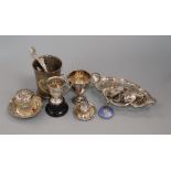 A group of assorted mainly silver items, including a beaker, pierced dish, two small trophy cups and