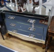 A mirrored three drawer chest W.90cm