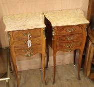 A pair of Louis XVI design marble top bombe bedside chests W.39cm