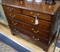 A small George III oak chest of drawers W.96cm