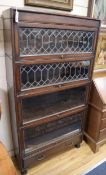 A Globe Wernicke style oak four section bookcase W.87cm