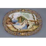 An oval maiolica dish, 19th century length 38cm