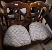 A set of four Victorian mahogany dining chairs