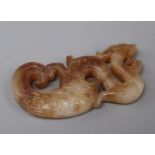 A russet jade dragon carving