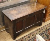 A 17th century oak six plank coffer W.97cm