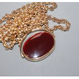 A 9ct yellow gold-mounted oval swivel fob seal set bloodstone and carnelian matrices, on 9ct gold