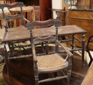 A pair of Victorian beech canework child's elbow chairs and a similar long stool Stool 93cm