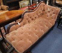 A Victorian mahogany chaise longue upholstered in buttoned peach fabric L.190cm