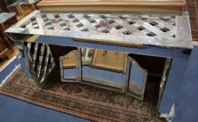 A mirrored dressing table and triple mirror Table W.134cm