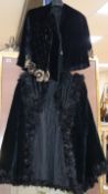 A Victorian crushed velvet, feather and bead cloak together with a 1930's sequin jacket