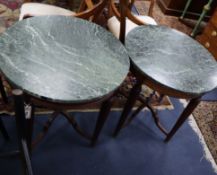 A pair of Continental circular mahogany marble top occasional tables Diameter 65cm