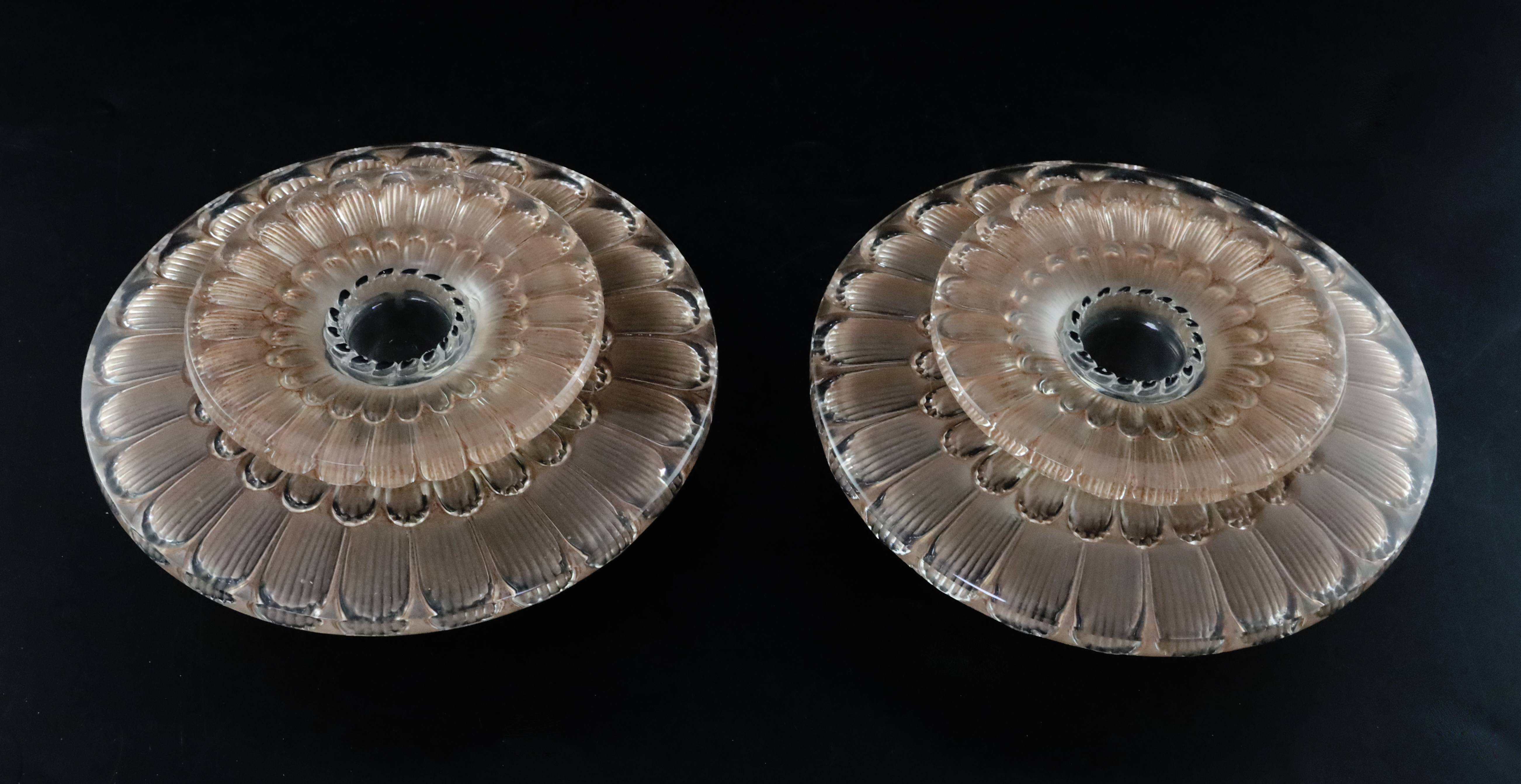 A pair of Rene Lalique Dahlia pattern frosted glass candleholders, Model 2114, 1930's, each of