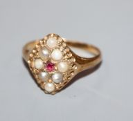 A George V 18ct gold, split pearl and ruby set cluster marquise shaped dress ring, size M.