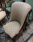 A Victorian rosewood nursing chair