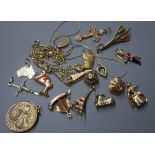 Two 9ct gold fine chains, an engraved cross pendant, two key and fob charms and a collection of