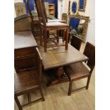 An 18th century style oak dining suite, comprising sideboard, refectory table and eight wood