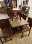 An 18th century style oak dining suite, comprising sideboard, refectory table and eight wood