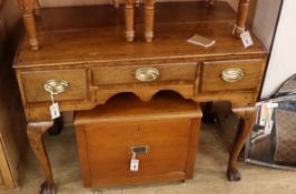 A George III oak side table W.96cm