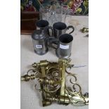 A pair of Victorian brass brackets and assorted tankards