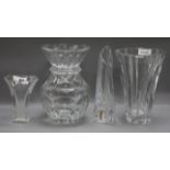 Four Baccarat crystal vases tallest 22cm