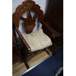 An Indian brass inlaid hardwood folding X-frame chair