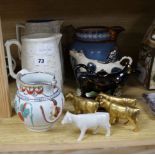 Four Victorian moulded jugs, two cow creamers etc.