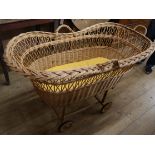 A wicker crib L.114cm