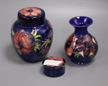 A Moorcroft anemone jar, vase and lidded pot tallest 16cm