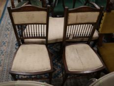 A pair of Edwardian inlaid side chairs