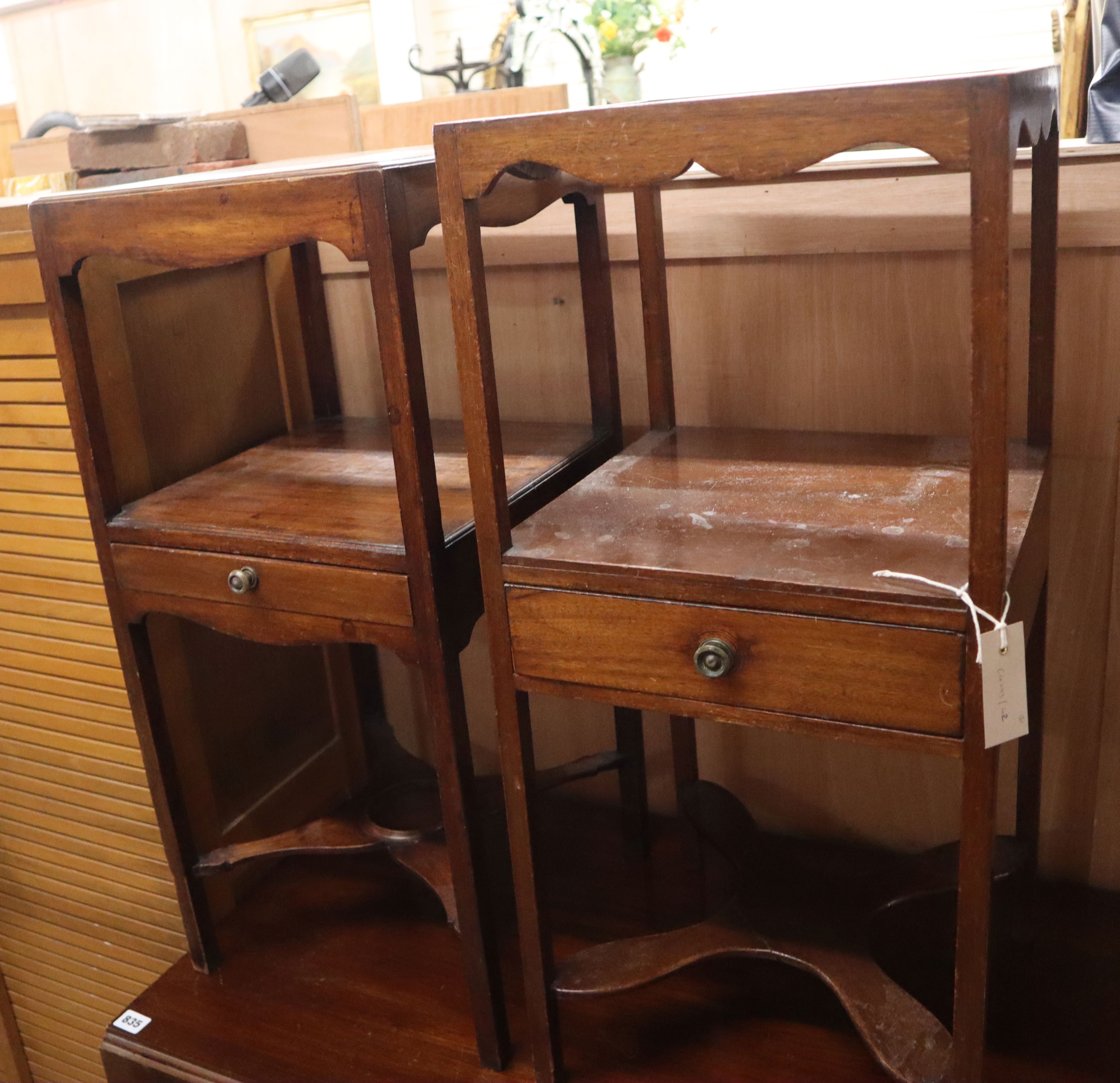 A near pair of George III mahogany two tier washstands W.35cm