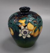 A Moorcroft passion flower baluster vase height 18cm