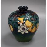 A Moorcroft passion flower baluster vase height 18cm