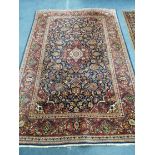 A Persian blue ground rug 200 x 132cm