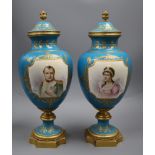 A pair of Sevres style 'Napoleon & Josephine' bleu celeste vases and covers, late 19th century