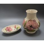 A Moorcroft magnolia baluster vase and an oval dish height 24cm