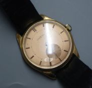 A gentleman's 18k yellow metal Lemania manual wind wristwatch with subsidiary seconds, on associated