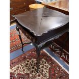 A late Victorian mahogany envelope card table W.60cm