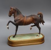 A Royal Worcester model of a Hackney Stallion after Doris Lindner, No. 394/500, with wooden plinth