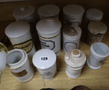 A collection of 19th century Continental ceramic chemist's jars, some with lids
