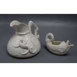 A Parian ware jug with lizard design and a fish sauce boat tallest 15cm